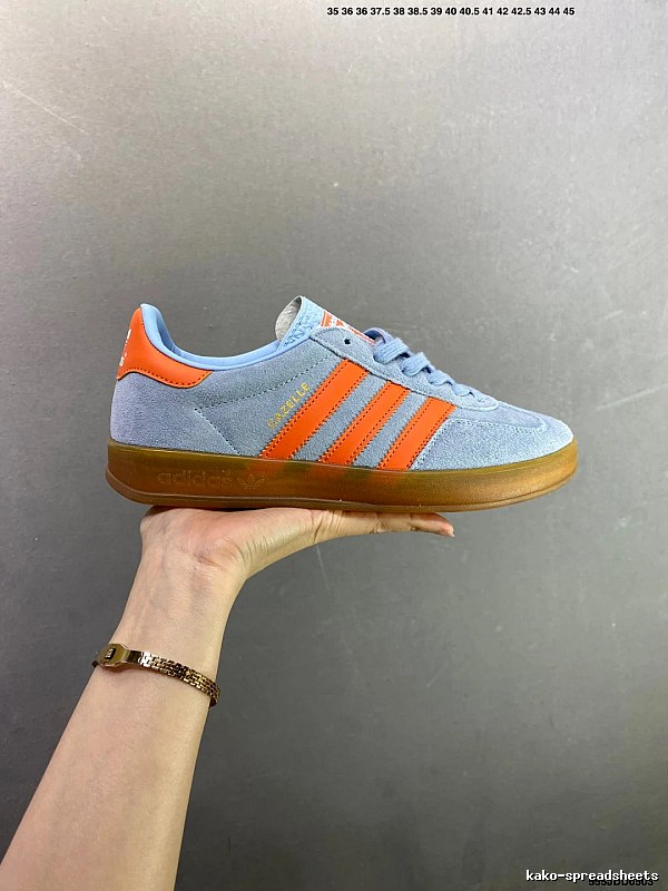 Adidas Light Blue and Orange Low-Profile Sneakers Highlighting Rounded Toe