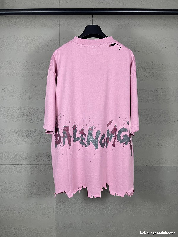 Balenciaga's pink T-shirt with a hole and graffiti style