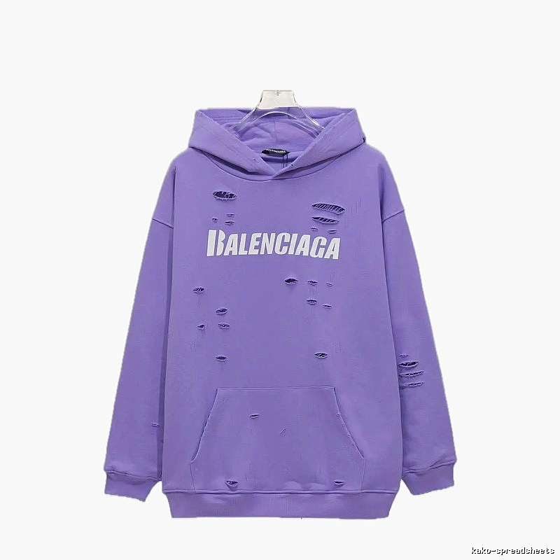 Balenciaga's ripped purple sweatshirt