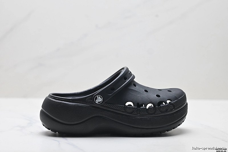 Black thick - soled Crocs clogs.