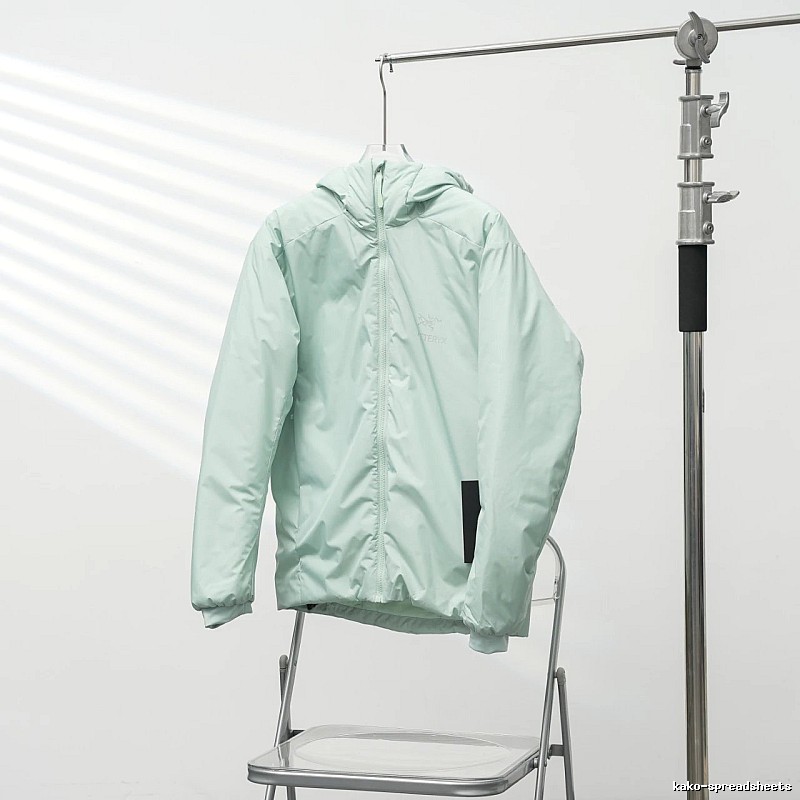 Clean Hooded Profile And Minimal Chest Branding Arc'teryx Lightweight Shell Jacket in Mint Green