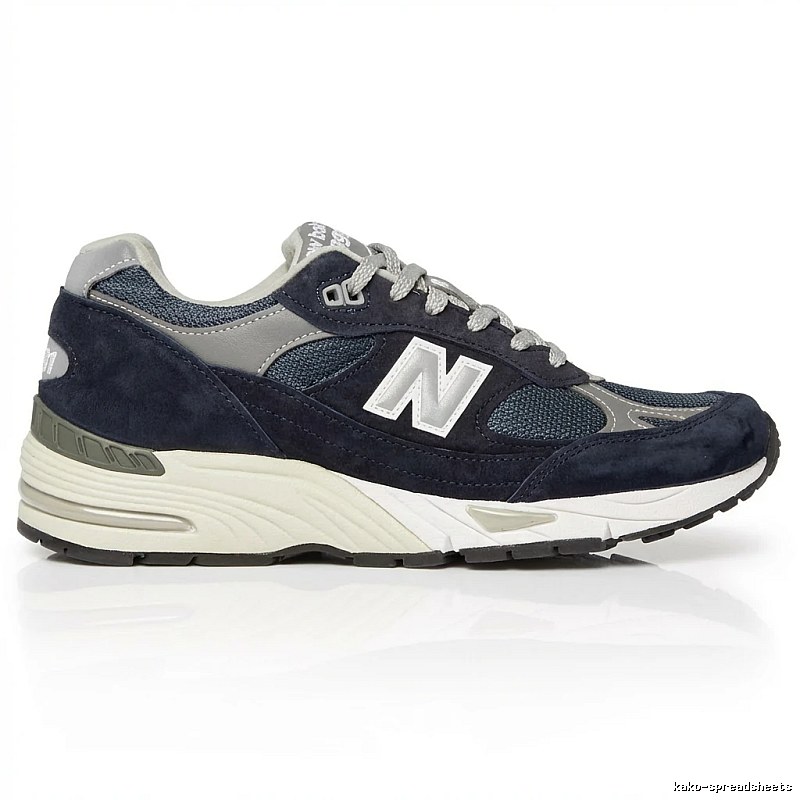 New Balance retro-style dark blue and grey sports shoes