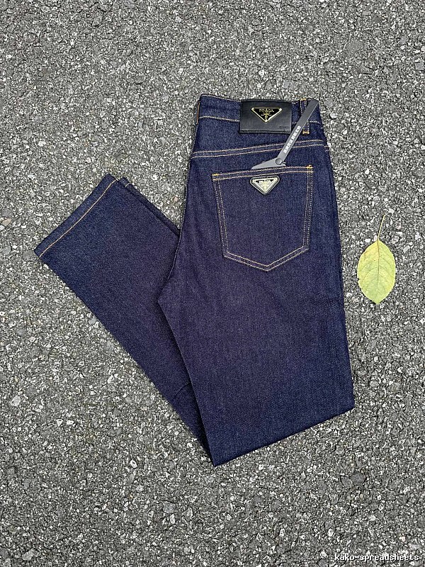 Prada Dark Indigo Logo Jeans with triangle badge hardware and contrast pocket stitching